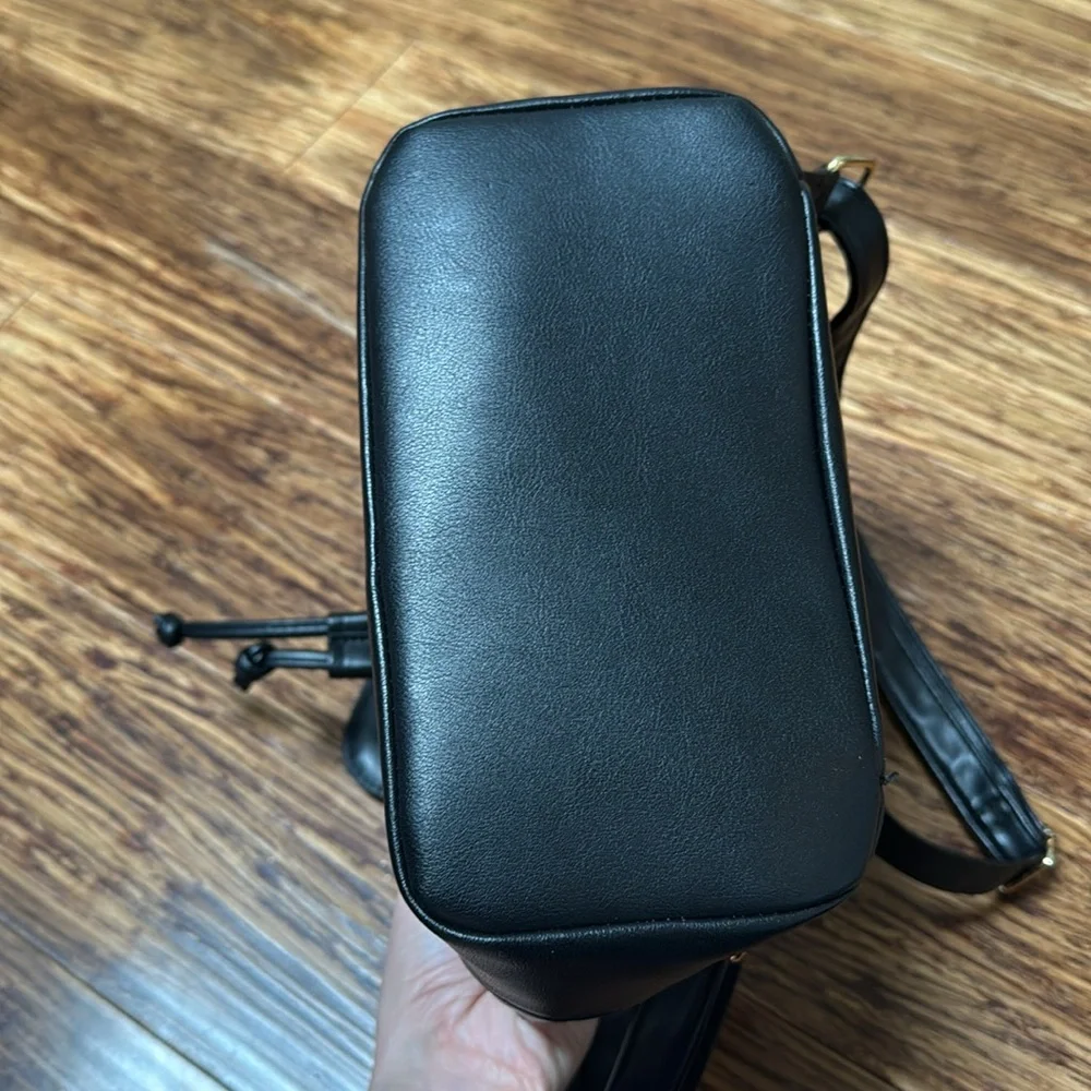 Alexis Bendel black quilted vegan leather adjustable backpack